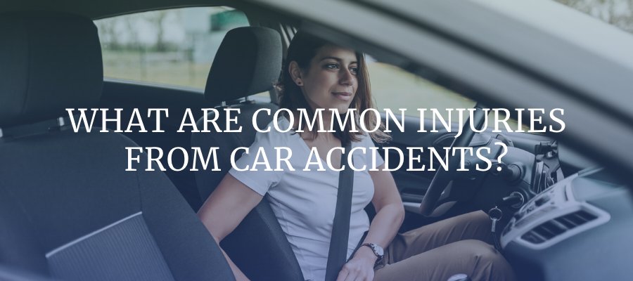 What Are Common Injuries From Car Accidents? Woman putting on seatbelt.